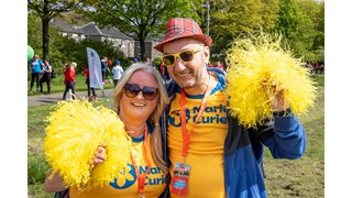 Three supporters walking